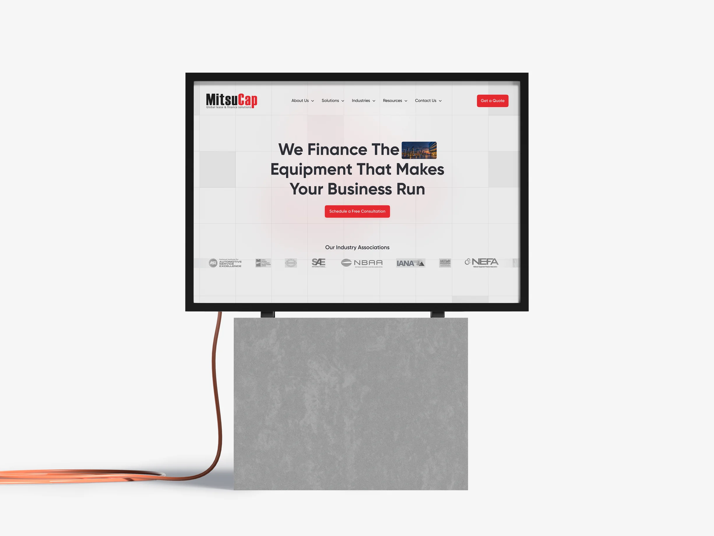 The MitsuCap website on a monitor